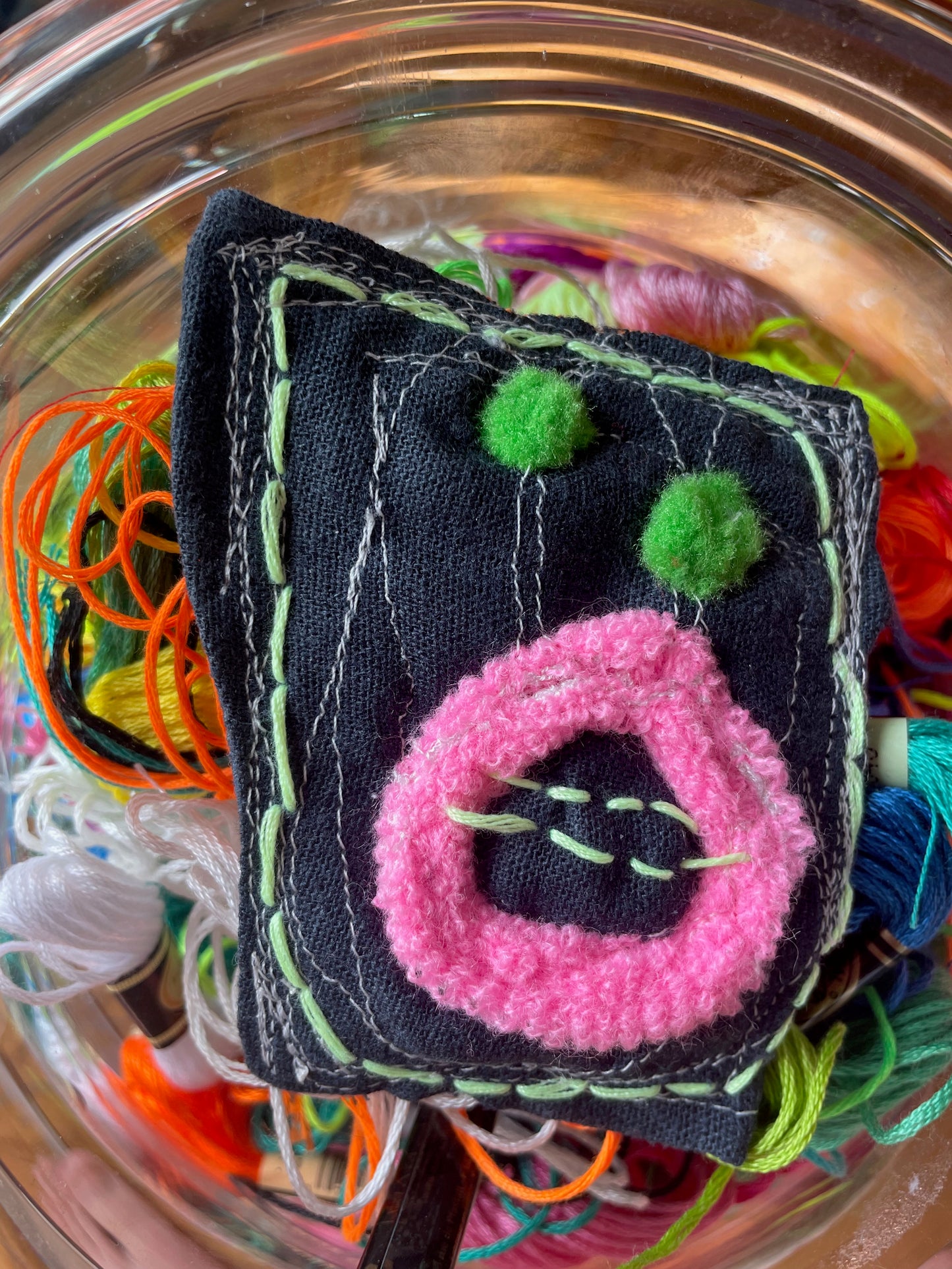 shocked creature w/ tree-frog-colored eyes / a brooch / one-of-a-kind